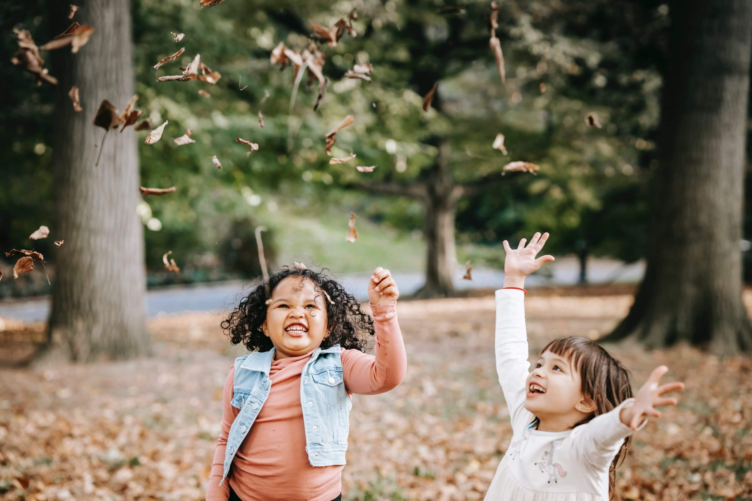 girls doing fall activities outside