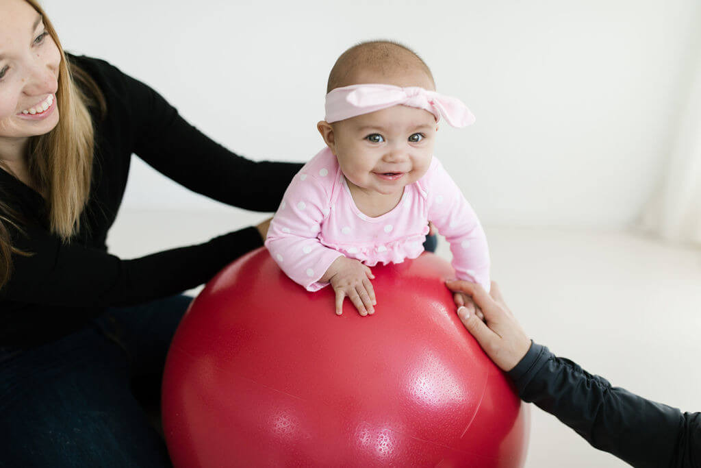 baby balancing at physical therapy